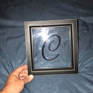 “C” glass framed wall decor
